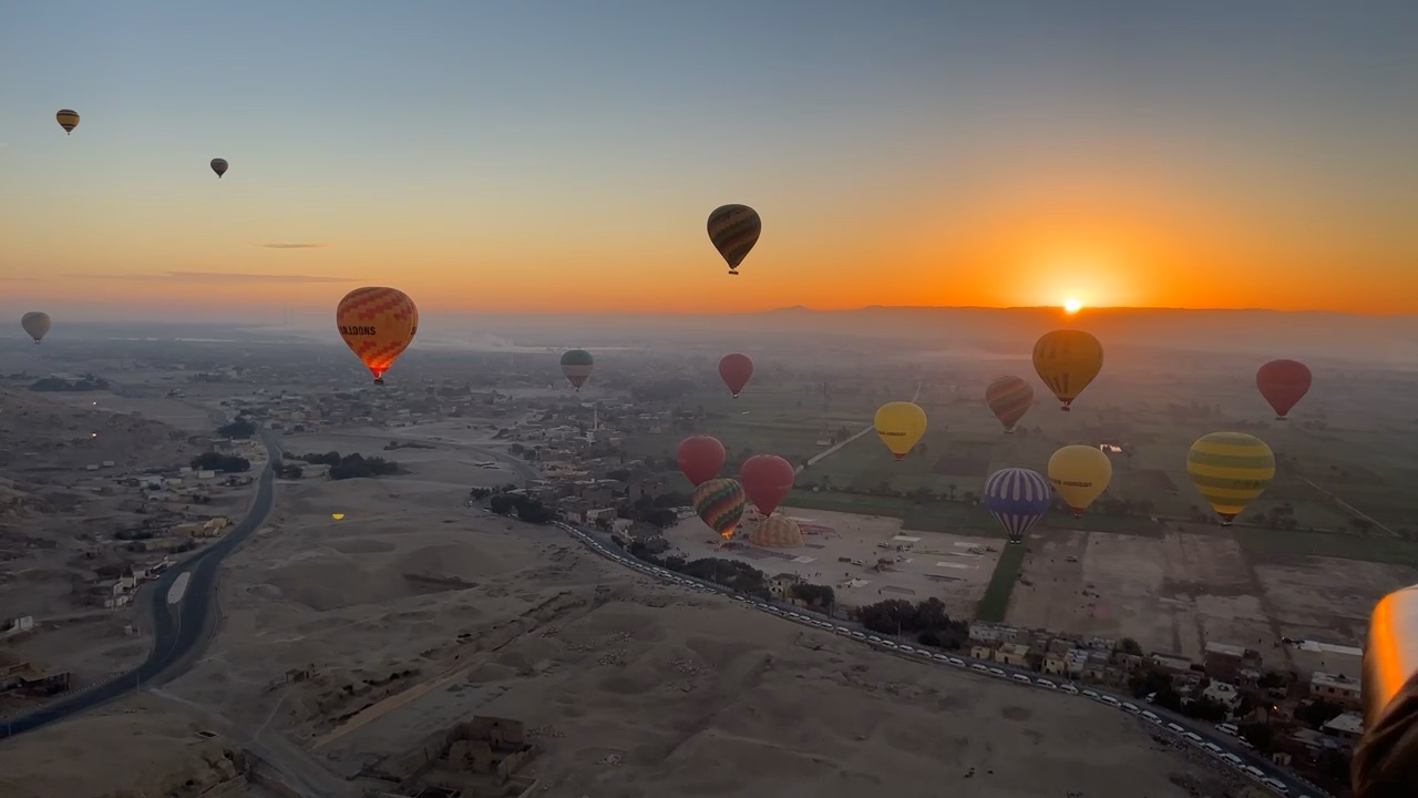 Hot air ballooning over ancient Luxor as the sun rises on New Year’s Eve