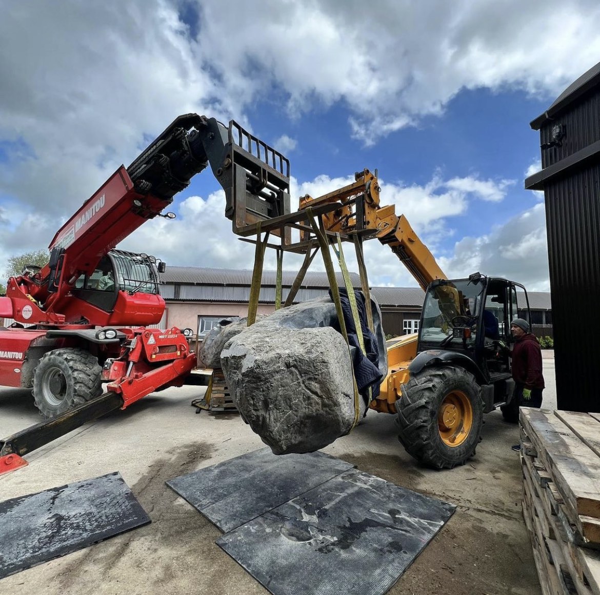 340 million year old boulders shipped to UK historic house art show