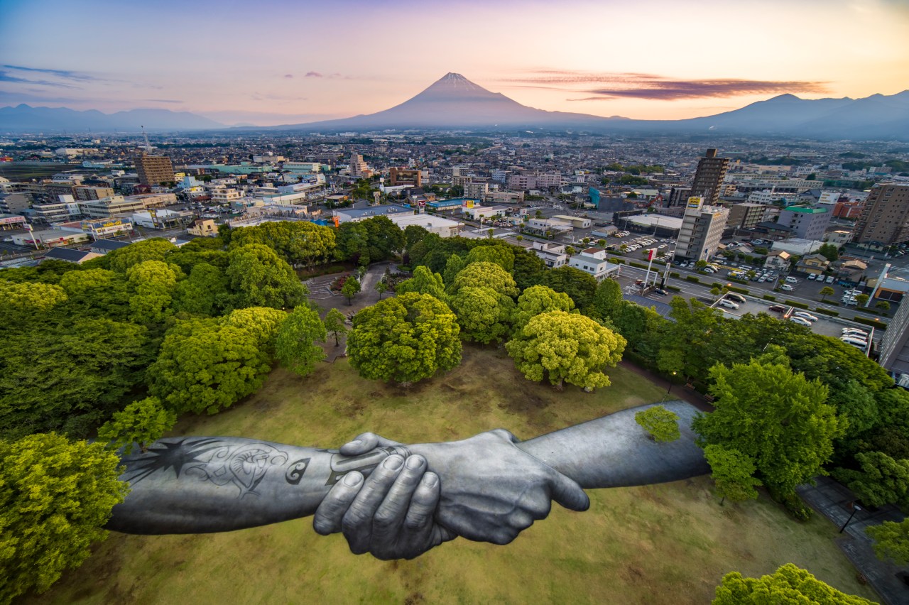 Giant hands stretching across the globe just reached&nbsp;Japan
